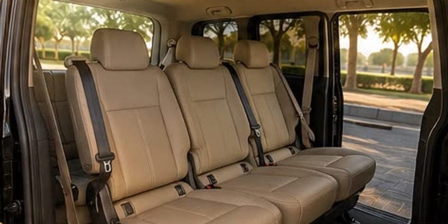 The V250's middle row in beige leather, side door open